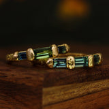 GREEN & BLUE SAPPHIRE SPECKLED TRILOGY BOWERBIRD RING - CLIO SASKIA